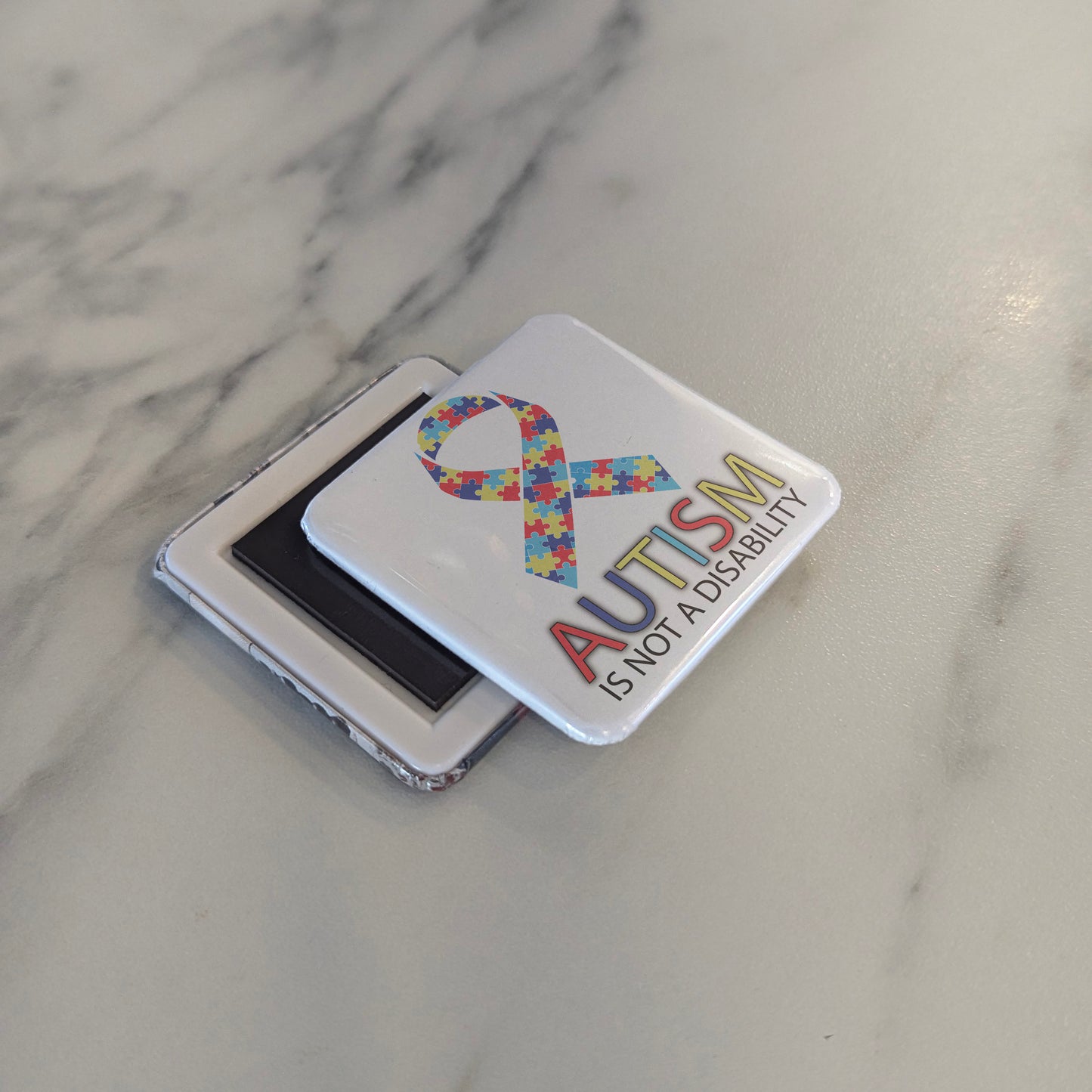 Autism is not a disability Fridge Magnet - PhiloPerse