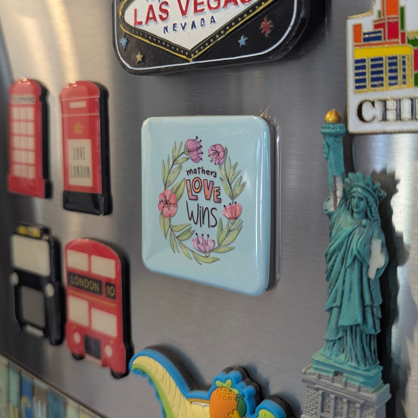Mother's love wins Fridge Magnet - PhiloPerse