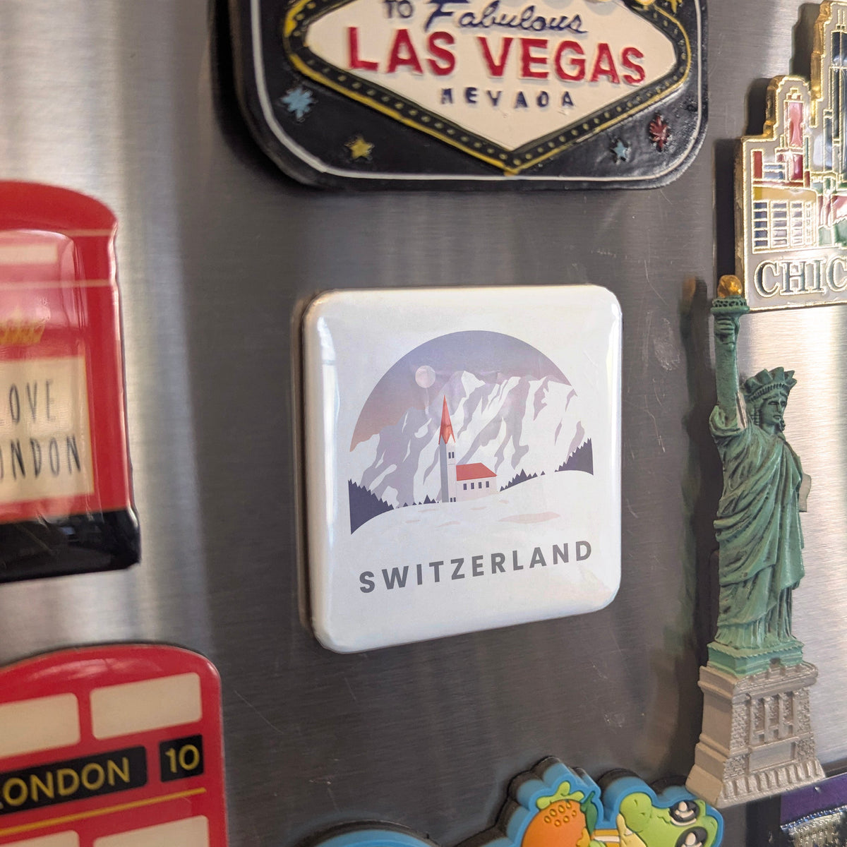 Switzerland Magnet | Land of the Alps, Watches, and the Heart of Europe | 2x2 | Made in Canada