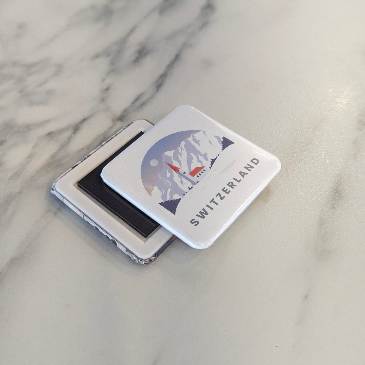 Switzerland Magnet | Land of the Alps, Watches, and the Heart of Europe | 2x2 | Made in Canada