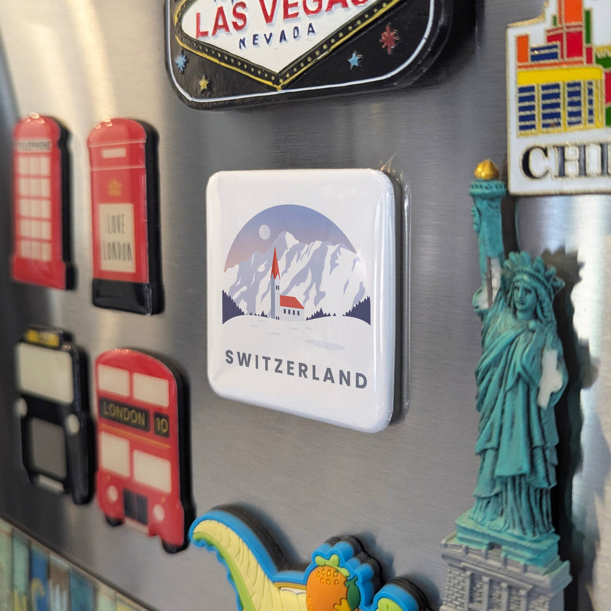 Switzerland Magnet | Land of the Alps, Watches, and the Heart of Europe | 2x2 | Made in Canada
